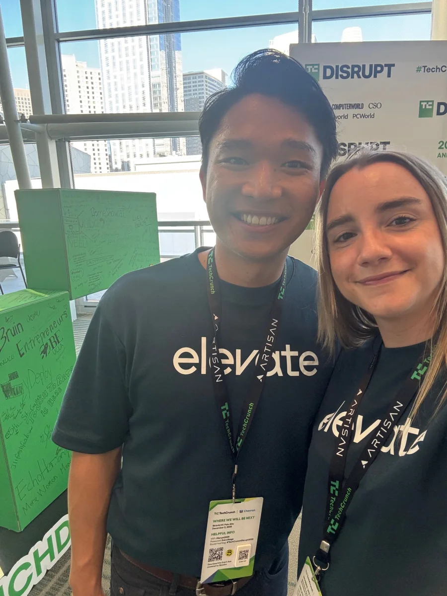 Guada and a teammate in Elevate t-shirts at TechCrunch Disrupt